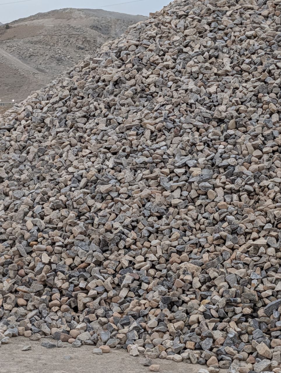 Stockpile of 2 by 4 inch angular rock at a Utah aggregate yard